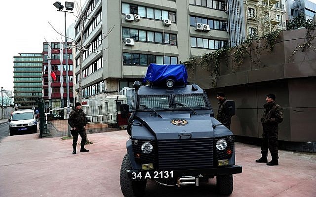 Turkish special force police stand guard outside the Cumhuriyet Daily Newspaper building on January 14, 2015 in Istanbul. The leading daily risked a backlash by printing excerpts from the first edition of French satirical weekly Charlie Hebdo. (photo credit: AFP/OZAN KOSE)
