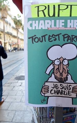 A sign that translates as 'Charlie Hebdo - Sold Out' at a newsstand in Montpellier on January 14, 2015 (photo credit: AFP/PASCAL GUYOT)