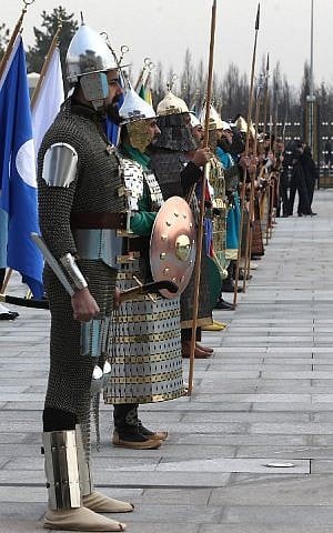 Soldiers in 16 former Turkish States' military uniforms are seen before Turkish President Recep Tayyip Erdogan welcomes Azerbaijani President Ilham Aliyev at the Presidential Palace in Ankara, on January 15, 2015. (photo credit: AFP/ADEM ALTAN) 