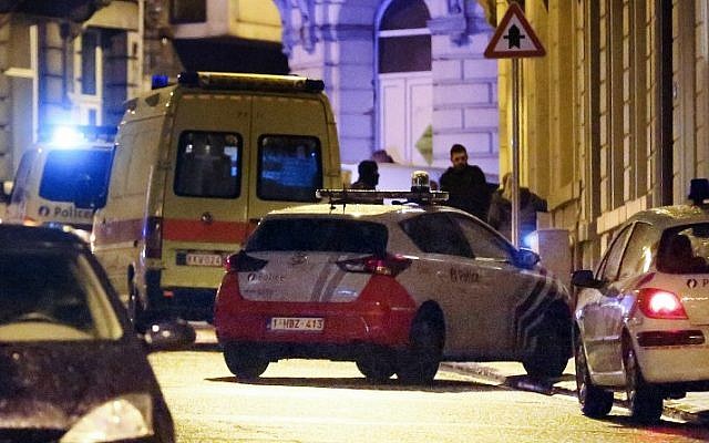 Police vehicles and vans are parked in a street as police set up a large security perimeter in the city center of Verviers, eastern Belgium, where two people were reportedly killed in an anti-terrorism operation on January 15, 2015. (photo credit: AFP/Belga/Bruno Fahy) Police vehicles and vans are parked in a street as police set up a large security perimeter in the city center of Verviers, eastern Belgium, where two people were reportedly killed in an anti-terrorism operation on January 15, 2015. (photo credit: AFP/Belga/Bruno Fahy)