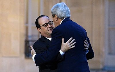 French President François Hollande welcomes US Secretary of State John Kerry prior, January 16, 2015. (photo credit: AFP/Rick Wilking, Pool) French President François Hollande welcomes US Secretary of State John Kerry prior, January 16, 2015. (photo credit: AFP/Rick Wilking, Pool)