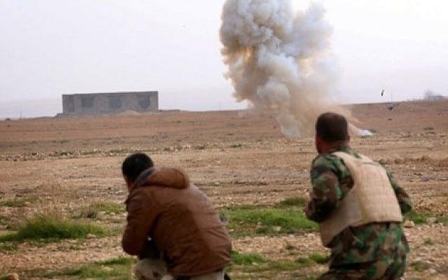 FILE: Kurdish peshmerga fighters detonate a landmine planted by the Islamic State (IS) group fighters on the outskirts of the village of Sinuni in the northern Iraqi district of Sinjar on January 15, 2015, after it was recaptured by Kurdish peshmerga troops. (Safin Hamed/AFP) FILE: Kurdish peshmerga fighters detonate a landmine planted by the Islamic State (IS) group fighters on the outskirts of the village of Sinuni in the northern Iraqi district of Sinjar on January 15, 2015, after it was recaptured by Kurdish peshmerga troops. (Safin Hamed/AFP)