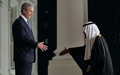 A file picture taken on November 14, 2008 shows Saudi King Abdullah (L) being greeted by then US President George W. Bush (R) on the North Portico of the White House in Washington, DC, prior to a dinner with leaders attending the Summit on Financial Markets. (Photo credit: AFP/ Files / Jim WATSON) A file picture taken on November 14, 2008 shows Saudi King Abdullah (L) being greeted by then US President George W. Bush (R) on the North Portico of the White House in Washington, DC, prior to a dinner with leaders attending the Summit on Financial Markets. (Photo credit: AFP/ Files / Jim WATSON)