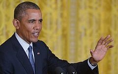 US President Barack Obama speaks during a press conference with Britain's Prime Minister David Cameron in the East Room of the White House on January 16, 2015 in Washington, DC. (Photo credit: AFP/MANDEL NGAN)