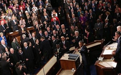 Members of Congress listen to US President Barack Obama deliver his State of the Union address in the House chamber of the US Capitol in Washington, DC, January 20, 2015. (AFP/Alex Wong)