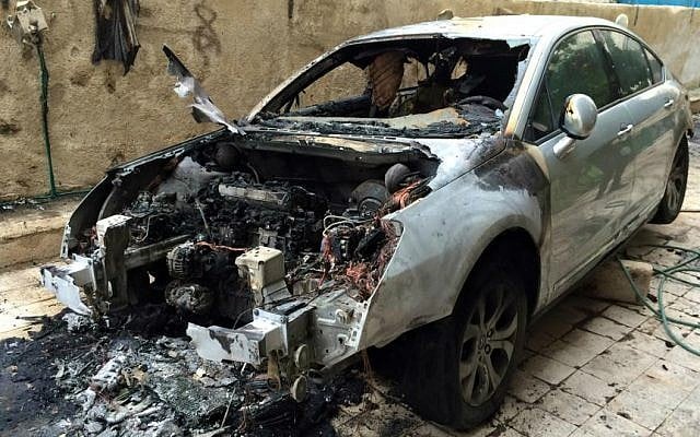 Mohammed Dajani's car, destroyed in an apparent arson attack, January 16, 2015. (Courtesy of Mohammed Dajani) Mohammed Dajani's car, destroyed in an apparent arson attack, January 16, 2015. (Courtesy of Mohammed Dajani)