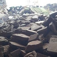 Jewish gravestones piled in a heap at the Brest Fortress in Belarus. (photo credit: Ilan Ben Zion/Times of Israel staff)
