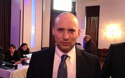 Economy minister Naftali Bennett at the Jewish Agency Aliya Salon in Paris, January 11, 2015 (photo credit: Elhanan Miller/Times of Israel)  
