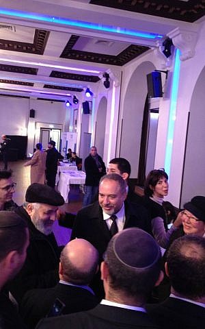 Israeli foreign minister Avigdor Liberman visits the Jewish Agency Aliya Salon in Paris, January 11, 2015 (photo credit: Elhanan Miller/Times of Israel)