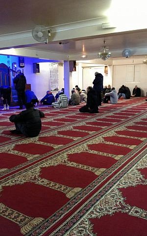 Muslim worshipers pray at Khalid Bin Walid Mosque on Myrha street, northern Paris, January 12, 2015 photo credit: Elhanan Miller/Times of Israel