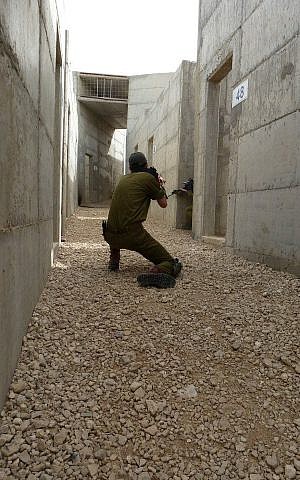 An IDF soldier training at the Zeelim Urban Warfare Center on April 12, 2012 (photo credit: Cpl. Gal Asuach/ IDF Spokesperson's Unit/ Flick An IDF soldier training at the Zeelim Urban Warfare Center on April 12, 2012 (photo credit: Cpl. Gal Asuach/ IDF Spokesperson's Unit/ Flick