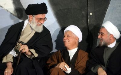 Iran's supreme leader Ayatollah Ali Khamenei, left, former president Akbar Hashemi Rafsanjani, center, and then top nuclear negotiator (now president) Hassan Rouhani, in Tehran, March, 9, 2006. (photo credit: AP Photo)