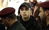 Jihad Mughniyeh sits during a memorial service for his father Imad in his hometown of Tair Debba, south Lebanon on Sunday, Feb. 17, 2008.  (photo credit: AP/Tara Todras-Whitehill)