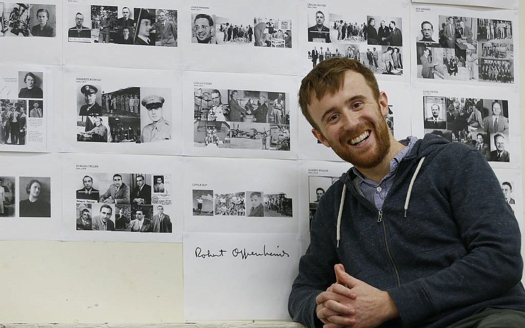 Actor John Heffernan poses with old photographs and a signature of Robert Oppenheimer, at a rehearsal studio in London. Heffernan is playing the part of Robert Oppenheimer in a new play the Royal Shakespeare Company is doing about the physicist, who led the team that developed the first nuclear weapon. (AP Photo/Kirsty Wigglesworth) Actor John Heffernan poses with old photographs and a signature of Robert Oppenheimer, at a rehearsal studio in London. Heffernan is playing the part of Robert Oppenheimer in a new play the Royal Shakespeare Company is doing about the physicist, who led the team that developed the first nuclear weapon. (AP Photo/Kirsty Wigglesworth)