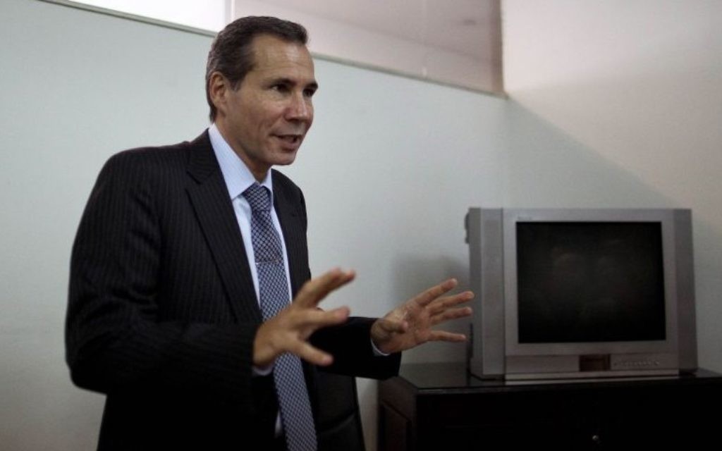 Alberto Nisman, the prosecutor investigating the 1994 bombing of the AMIA Jewish community center, talks to journalists in Buenos Aires, Argentina, Wednesday, May 29, 2013. (photo credit: AP Photo/Natacha Pisarenko) Alberto Nisman, the prosecutor investigating the 1994 bombing of the AMIA Jewish community center, talks to journalists in Buenos Aires, Argentina, Wednesday, May 29, 2013. (photo credit: AP Photo/Natacha Pisarenko)