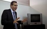 Alberto Nisman, the late prosecutor who investigated the 1994 bombing of the AMIA Jewish community center, talks to journalists in Buenos Aires, Argentina, May 29, 2013.  (AP Photo/Natacha Pisarenko)