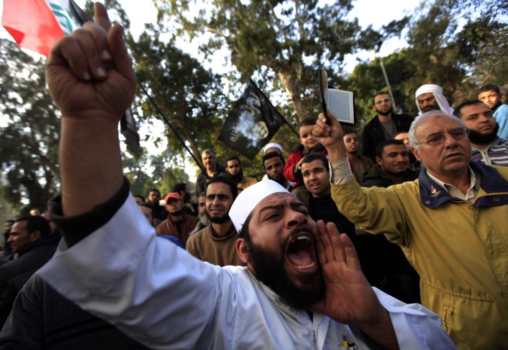 An Egyptian man chants slogans as he attends a protest held by Muslim Salafi groups against the French military attack on Mali, in front of the French embassy in Cairo, Egypt, Friday, Jan. 18, 2013 (photo credit: AP/Khalil Hamra) Illustrative: A protest held by Muslim Salafi groups against the French military attack on Mali, in front of the French embassy in Cairo, Egypt, Friday, January 18, 2013. (photo credit: AP/Khalil Hamra)