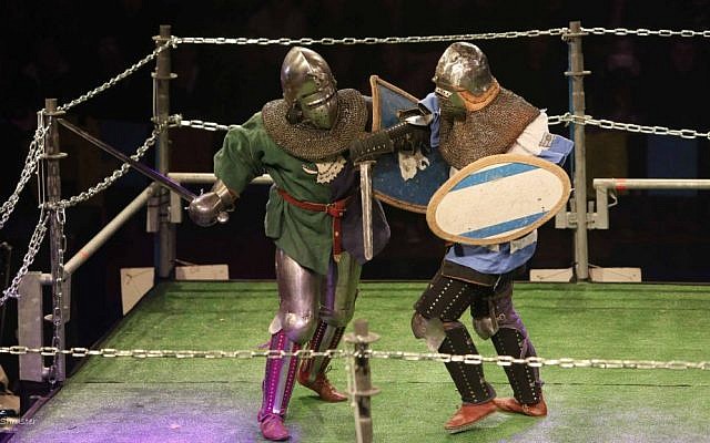 An Israeli "knight" (right) spars with an opponent at the World Medieval Fighting Championship, Rishon LeZion, January 22, 2015. (photo credit: Ariel Shrooster) An Israeli "knight" (right) spars with an opponent at the World Medieval Fighting Championship, Rishon LeZion, January 22, 2015. (photo credit: Ariel Shrooster)