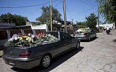 The funeral procession of late prosecutor Alberto Nisman enters the cemetery in Buenos Aires, Argentina, Thursday, Jan. 29, 2015. (photo credit: AP Photo/Rodrigo Abd)