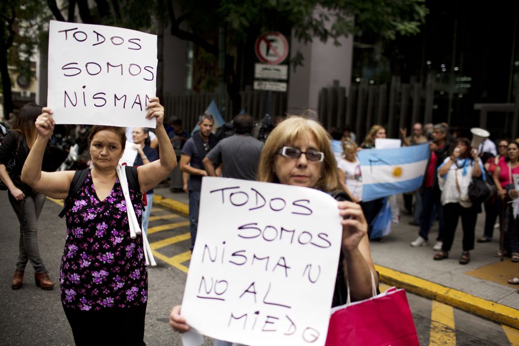 Women protest while holding signs that read in Spanish 'We are all Nisman, No to Fear,' referring to the death of special prosecutor Alberto Nisman, outside Congress in Buenos Aires, Argentina, Monday, Jan. 19, 2015. (photo credit: AP Photo/Rodrigo Abd) Women protest while holding signs that read in Spanish 'We are all Nisman, No to Fear,' referring to the death of special prosecutor Alberto Nisman, outside Congress in Buenos Aires, Argentina, Monday, Jan. 19, 2015. (photo credit: AP Photo/Rodrigo Abd)