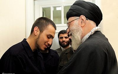 Iranian Supreme Leader Ayatollah Khamenei and Jihad Mughniyeh (photo credit: @khamenei_ir, Twitter)