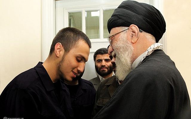Iranian Supreme Leader Ayatollah Khamenei and Jihad Mughniyeh (photo credit: @khamenei_ir, Twitter)