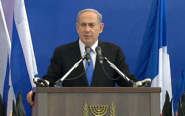 Prime Minister Benjamin Netanyahu addresses the crowd at the funeral for four French Jews killed in an attack at a kosher supermarket in Paris, on Tuesday, January 13, 2015 (screen capture)