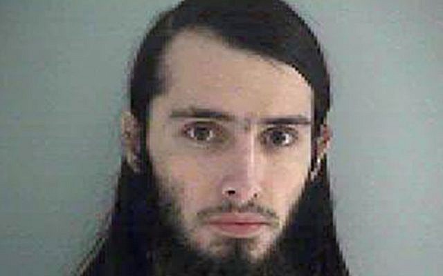 Christopher Lee Cornell plotted to attack the US Capitol in Washington and kill government officials inside it and spoke of his desire to support the Islamic State militant group, the FBI said on January 14, 2015. (photo credit: AP Photo/Butler County Jail) Christopher Lee Cornell plotted to attack the US Capitol in Washington and kill government officials inside it and spoke of his desire to support the Islamic State militant group, the FBI said on January 14, 2015. (photo credit: AP Photo/Butler County Jail)
