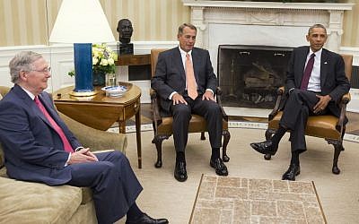 In this Sept. 9, 2014 file photo, President Barack Obama meets with Senate Minority Leader Mitch McConnell of Ky., left, and House Speaker John Boehner of Ohio in the Oval Office of the White House in Washington.  (photo credit: AP Photo/Evan Vucci, File)