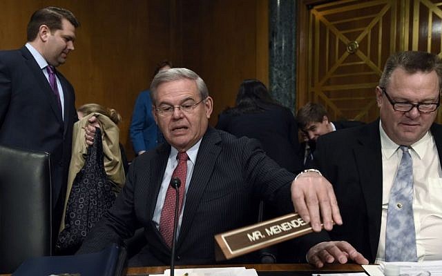 Senate Banking Committee member Sen. Robert Menendez, D-N.J. (center), sitting next to Sen. Jon Tester, D-Mont. (right) at the committee's hearing on Iran sanctions, on Capitol Hill in Washington, January 27, 2015. (photo credit: AP/Susan Walsh) Senate Banking Committee member Sen. Robert Menendez, D-N.J. (center), sitting next to Sen. Jon Tester, D-Mont. (right) at the committee's hearing on Iran sanctions, on Capitol Hill in Washington, January 27, 2015. (photo credit: AP/Susan Walsh)