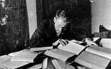 Eliezer Ben-Yehuda, credited with helping modernize the Hebrew language, at his desk in Jerusalem in 1912. (Shlomo Narinsky, first published 1918 in Jerusalem, via Wikimedia Commons)