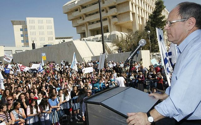 Yesha Council head Dani Dayan speaks at a settler's protest outside PM Benjamin Netanyahu's office in Jerusalem against the planned renewal of a settlement construction freeze, November 21, 2010. (photo credit: Miriam Alster/Flash90)