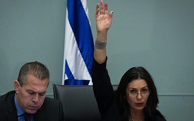 Likud MK Miri Regev (right) seen with fellow party member and Interior Minister Gilad Erdan at the Knesset, December 8, 2014. (photo credit: Miriam Alster/Flash90)