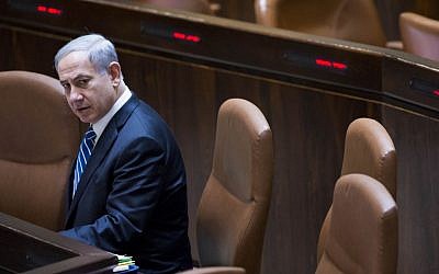 Prime Minister Benjamin Netanyahu in the Knesset during a vote on a bill to dissolve the parliament, on December 8, 2014. (photo credit: Yonatan Sindel/Flash90)