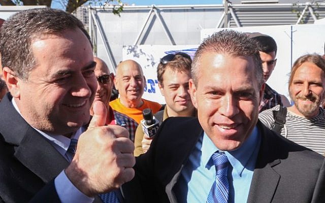 Then-interior minister Gilad Erdan (right) and Transportation Minister Yisrael Katz cast their vote in the Likud primary elections in Tel Aviv on December 31, 2014. (Flash90) Then-interior minister Gilad Erdan (right) and Transportation Minister Yisrael Katz cast their vote in the Likud primary elections in Tel Aviv on December 31, 2014. (Flash90)