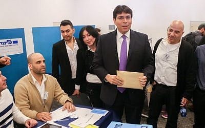 Likud MK Danny Danon casts his vote in the Likud primary elections on December 31, 2014. (Photo credit: Flash90)