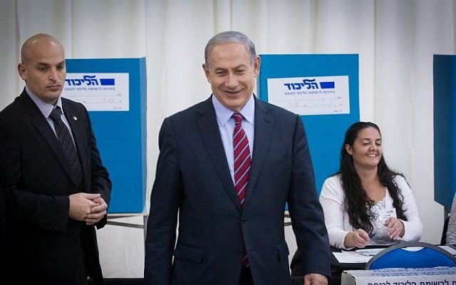Prime Minister Benjamin Netanyahu casts his vote as his Likud party opened the polls for its primary elections on December 31, 2014. (Miriam Alster/Flash90) Prime Minister Benjamin Netanyahu casts his vote as his Likud party opened the polls for its primary elections on December 31, 2014. (Miriam Alster/Flash90)