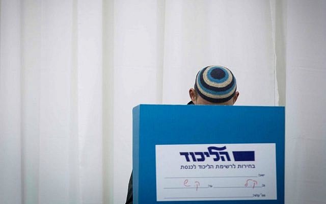 A Likud member cast shis vote in Jerusalem in the party's primary elections, December 31, 2014. (Miriam Alster/Flash90) A Likud member cast shis vote in Jerusalem in the party's primary elections, December 31, 2014. (Miriam Alster/Flash90)