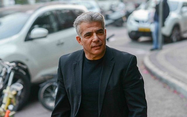 Yesh Atid leader Yair Lapid arrives at a party conference in Tel Aviv, January 1, 2015. (Ben Kelmer/FLASH90) Yesh Atid leader Yair Lapid arrives at a party conference in Tel Aviv, January 1, 2015. (Ben Kelmer/FLASH90)