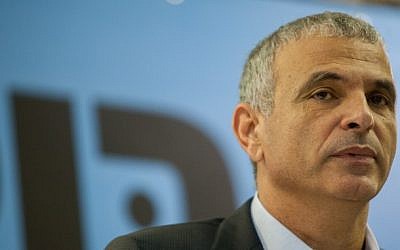 Kulanu party leader Moshe Kahlon at a joint press conference with fellow Kulanu candidate Rachel Azaria in Jerusalem, January 6, 2015. (Ben Kelmer/Flash90)