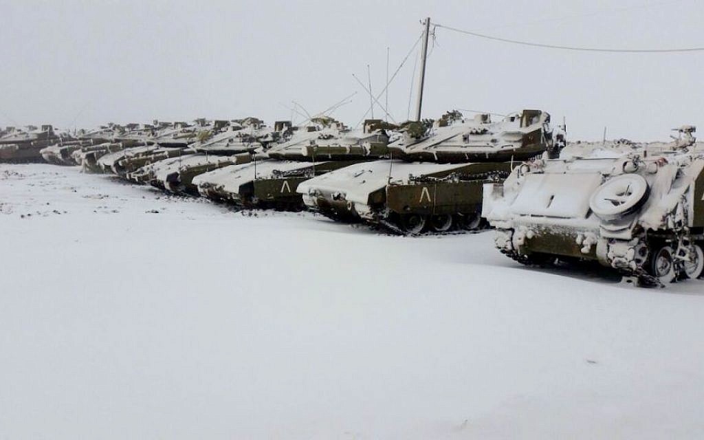 Snow-covered tanks from the IDF's 401 armed brigade, in Northern Israel on Wednesday, January 7, 2015 (photo credit: IDF Spokesperson/FLASH90)