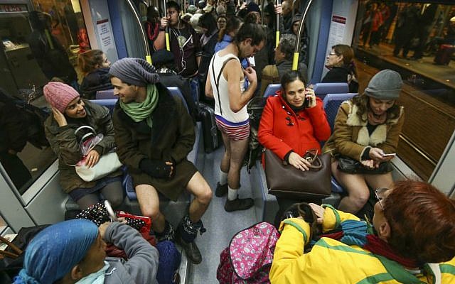 Improv Israel members ride the Jerusalem light rail train in their underwear for No Pants Train Ride, January 11, 2015. (Nati Shohat/Flash 90)