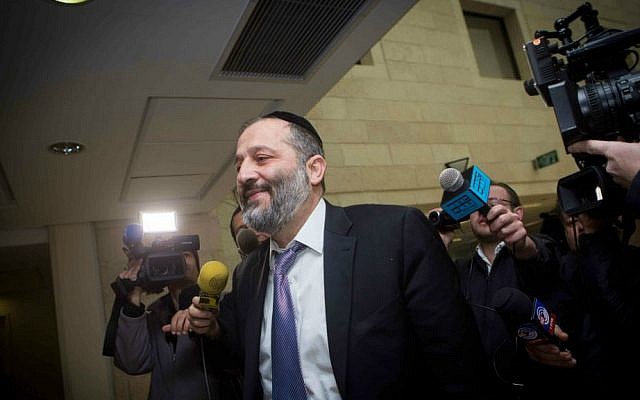 Shas leader Aryeh Deri arrives at the party's Jerusalem headquarters, January 12, 2015. (Miriam Alster/FLASH90)