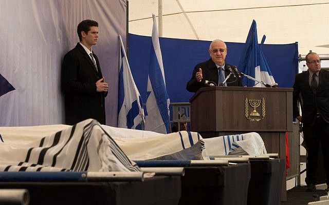 Reuven Rivlin speaking at the Jerusalem funeral for the four victims of the Paris terror attack, on January 13, 2015. (photo credit: Amit Shabi/POOL/Flash90) Reuven Rivlin speaking at the Jerusalem funeral for the four victims of the Paris terror attack, on January 13, 2015. (photo credit: Amit Shabi/POOL/Flash90)