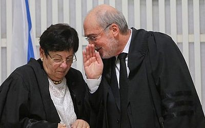 Supreme Court Chief Justice Miriam Naor seen with outgoing Deputy Supreme Court President Asher Grunis at a ceremony in Jerusalem, January 15, 2015. (photo credit: Alex Kolomoisky/Flash90)