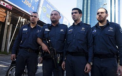 Officers from the Israeli Prison Services who shot and captured the terrorist in Tel Aviv. They and others are being hailed as heroes in the Israeli press (photo credit; mir Levy/Flash90)