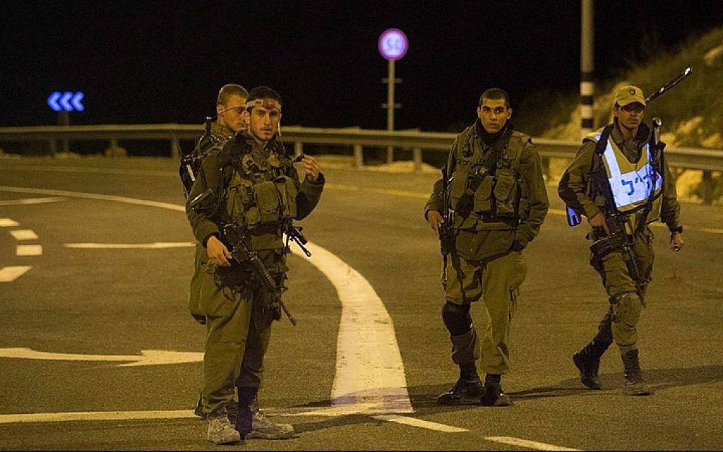 File photo: IDF forces blocking a road along the border with Lebanon, Northern Israel on January 21, 2015. (photo credit: Basal Awidat/Flash90)