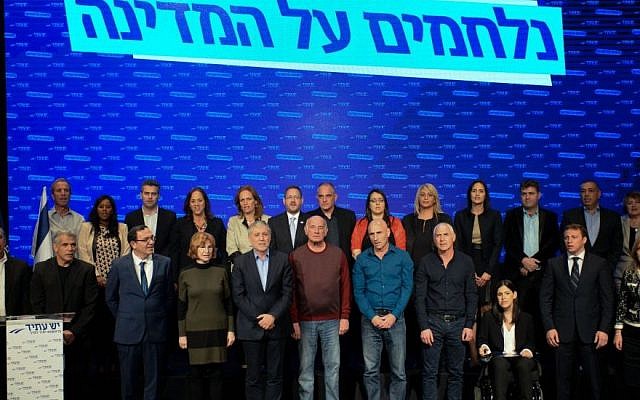 Yair Lapid, second from left in front row, with the rest of the Yesh Atid Knesset candidates, January 26, 2015. (Photo credit: Ben Kelmer/Flash90)