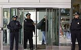 Boston Police Superintendent-in-Chief William Gross, center left, departs Brigham and Women's Hospital, Jan. 20, 2015.  Stephen Pasceri allegedly murdered his mother's doctor, Michael Davidson, in a hospital exam room. (Photo credit: Steven Senne/AP)