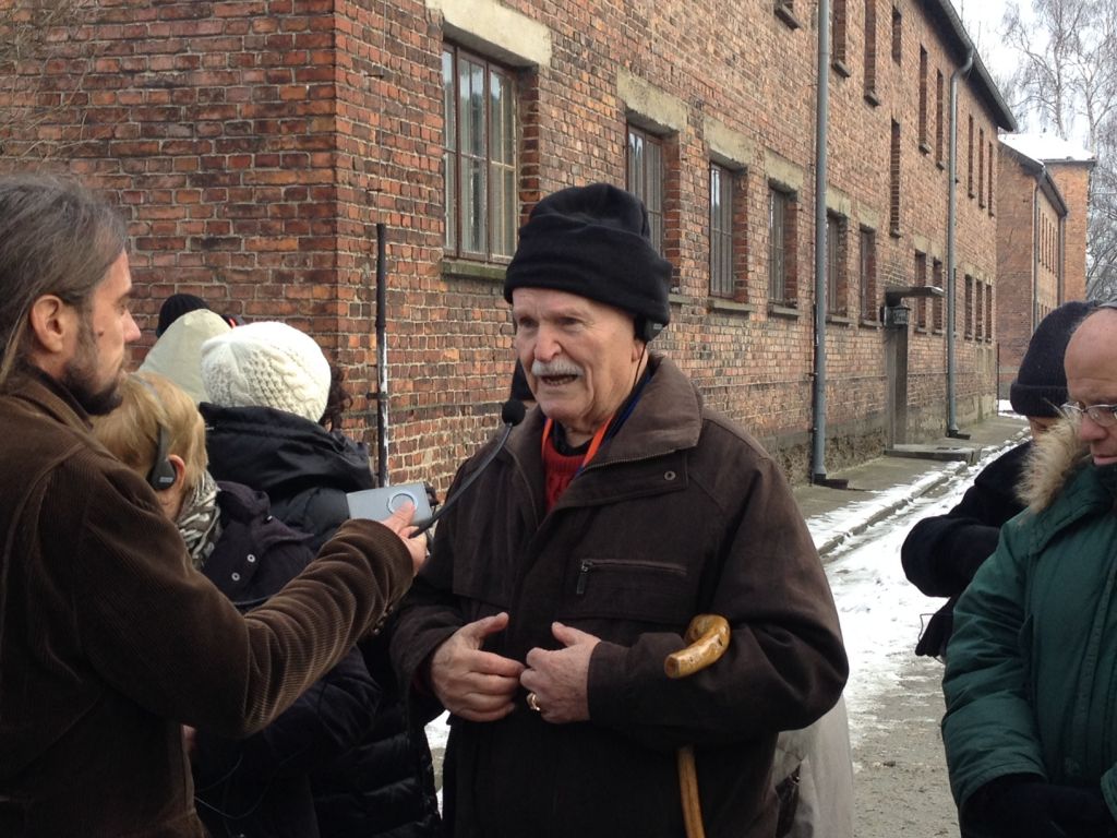 Shimon Kahan from Hod Hasharon recounts an instance in which his life was miraculously spared at Auschwitz-Birkenau on Wednesday, January 28, 2015. (Amanda Borschel-Dan/The Times of Israel)